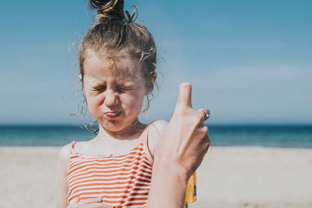 kind wil geen zonnenbrand